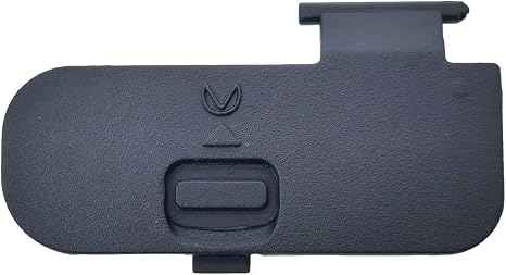 Camera battery chamber cover in black plastic with latch and thumb button