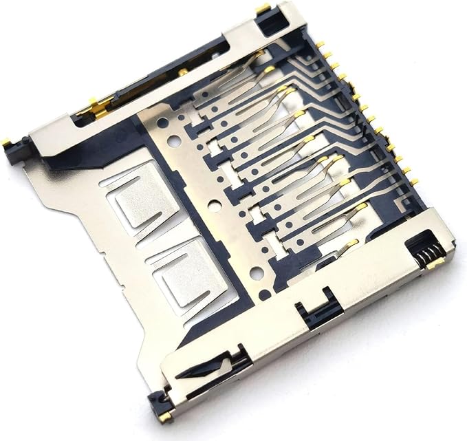 Replacement memory card slot connector assembly with exposed circuit contacts and pins.