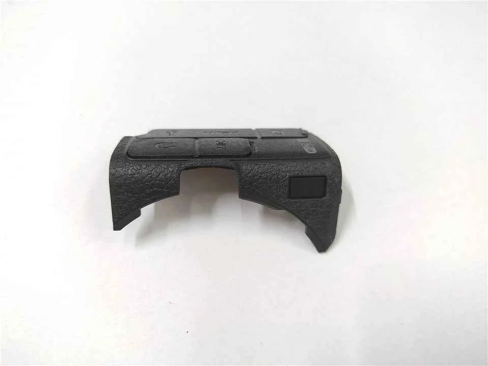 Black rubber lid cover for camera ports with raised grip