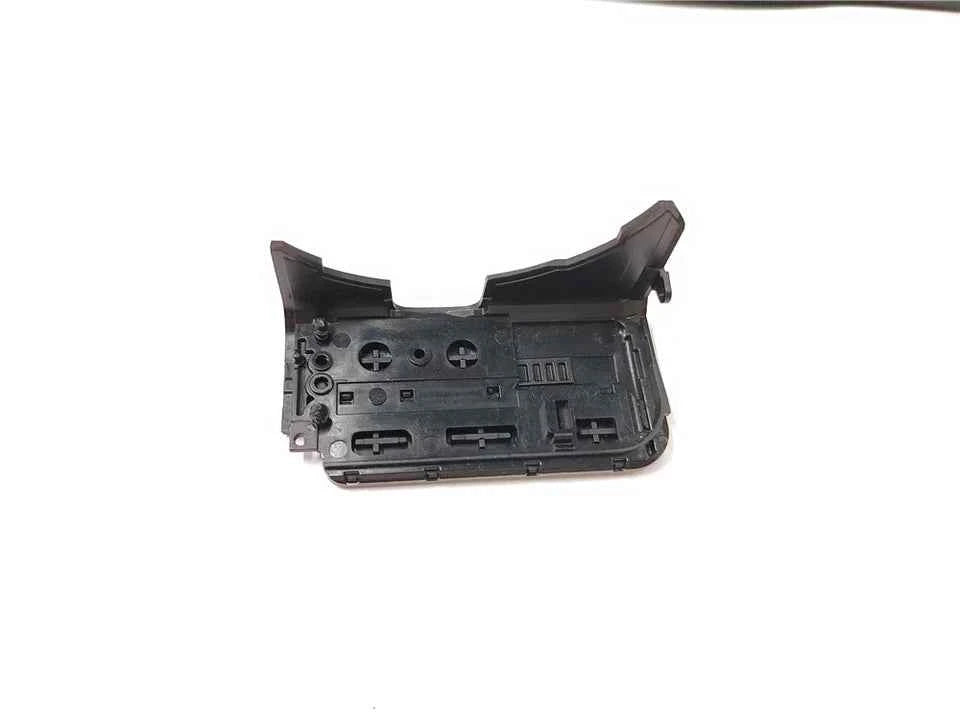Black camera interface cover assembly with exposed underside electronics